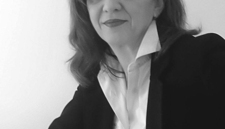 Corinne Casella